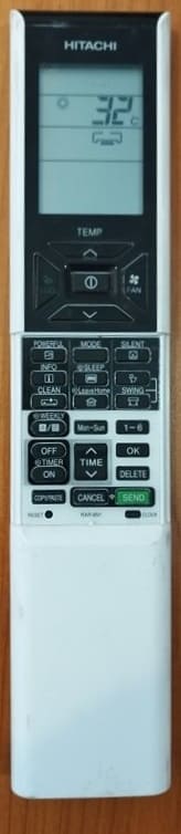 Télécommande de climatiseur Hitachi avec affichage numérique et multiples options de contrôle.
